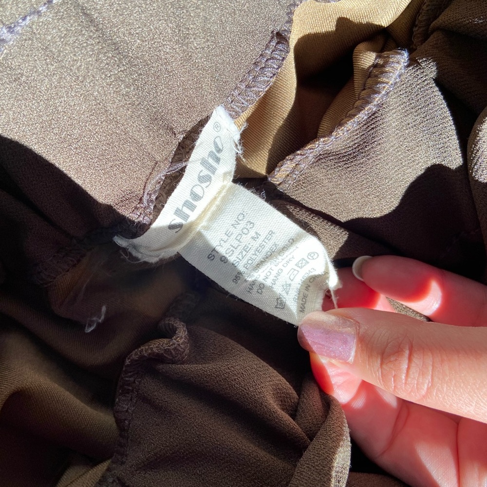 Wide leg olive green pants.